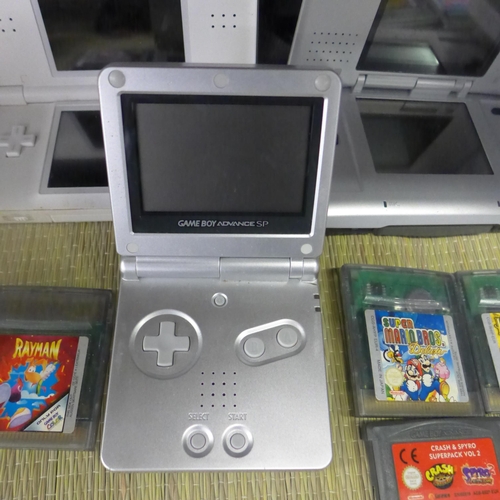 2217 - Nintendo Game Boy (yellow) with games, Game Boy Advance SP and 2 Nintendo DSs