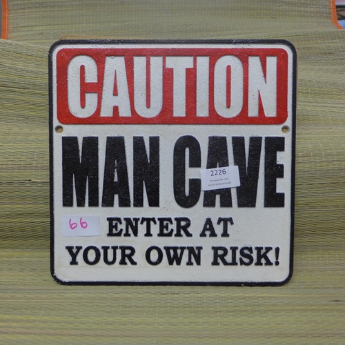 2226 - Caution man cave warning sign * this lot is subject to VAT