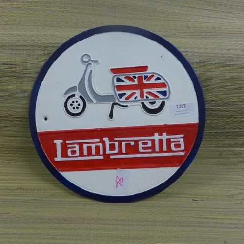 2282 - Round Lambretta wall plaque * this lot is subject to VAT