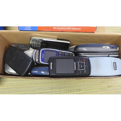 2321 - Three unused boxed Nokia phones (N301, N113 and N3120) and qty. of chargers, cables and 15 misc. mob... 