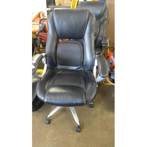 2460 - 2 Leather effect office swivel chairs