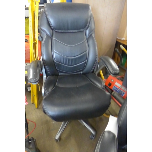 2460 - 2 Leather effect office swivel chairs