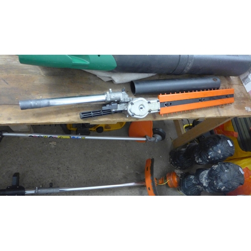 2478 - Petrol driven multi tool with strimmer, hedgecutter and chainsaw attachments plus extender poles