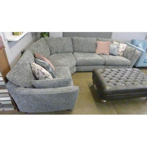 1301 - A charcoal upholstered corner sofa