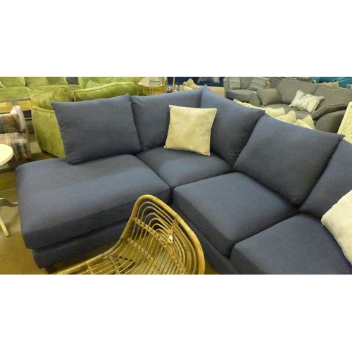 1303 - A navy blue upholstered corner sofa