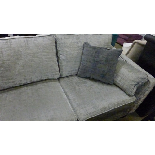 1348 - A silver and bronze velvet five seater sofa