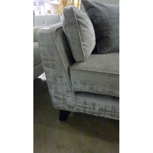 1348 - A silver and bronze velvet five seater sofa