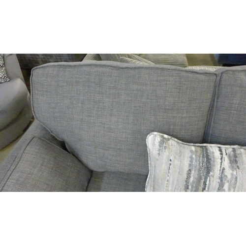 1357 - A charcoal upholstered two seater sofa