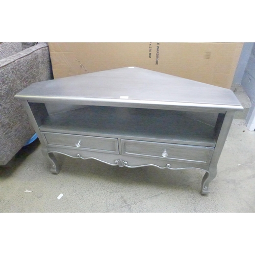 1555 - A silver two drawer corner media unit