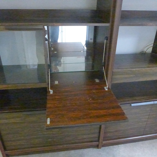 1559 - Two piece walnut effect wall unit