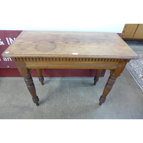 101 - A Victorian Gothic Revival pitch pine side table