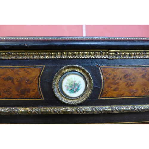 113 - A Victorian ebonised and amboyna side cabinet