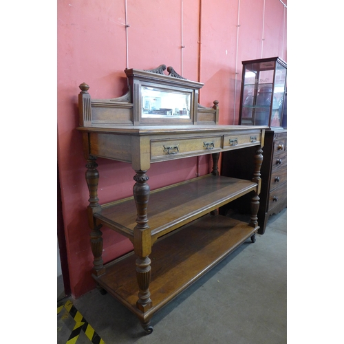 114 - A Victorian Aesthetic Movement pollard oak three tier buffet sideboard, manner of Lamb, Manchester