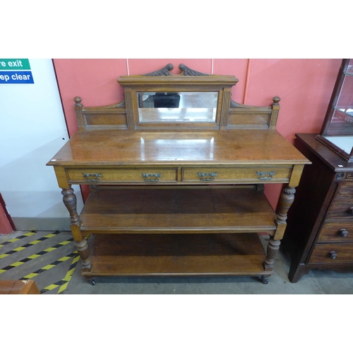 114 - A Victorian Aesthetic Movement pollard oak three tier buffet sideboard, manner of Lamb, Manchester