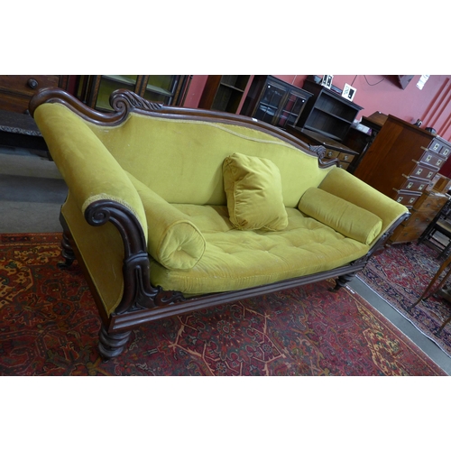 125 - A Regency rosewood and yellow fabric upholstered scroll arm settee