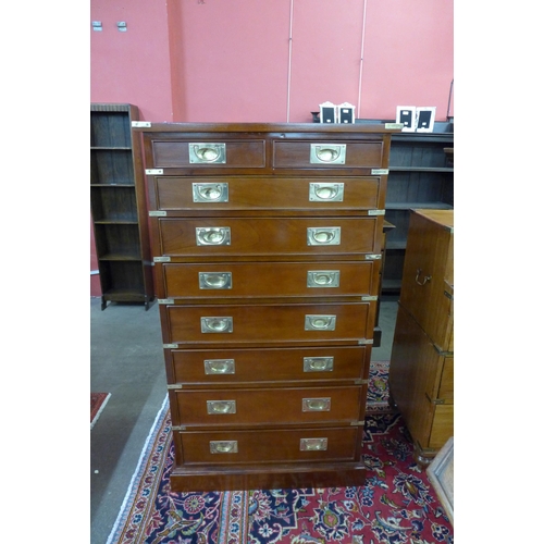 129 - A mahogany and brass mounted campaign style chest of drawers