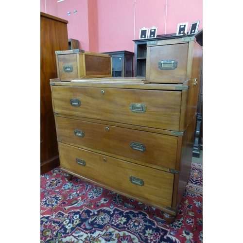 130 - A 19th Century teak and brass mounted military campaign chest of drawers