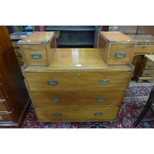 130 - A 19th Century teak and brass mounted military campaign chest of drawers