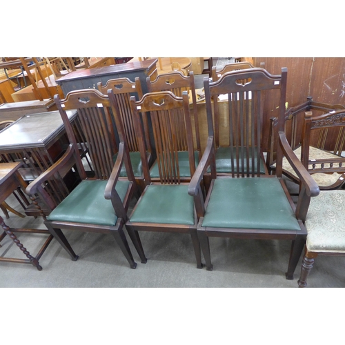 166 - A set of six Arts and Crafts mahogany dining chairs