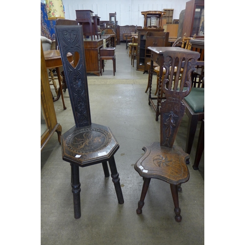 182 - Two Arts and Crafts carved oak spinning stools