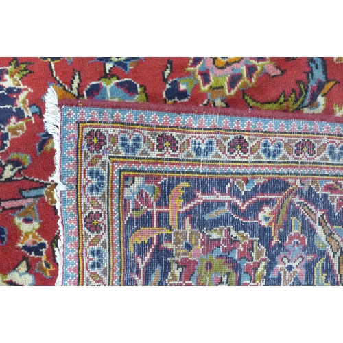 190 - A Persian red ground Kashan rug, 363 x 249cms