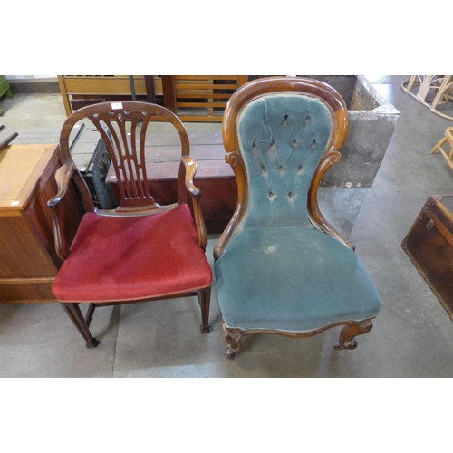 211 - A Victorian mahogany and upholstered spoonback armchair and another armchair