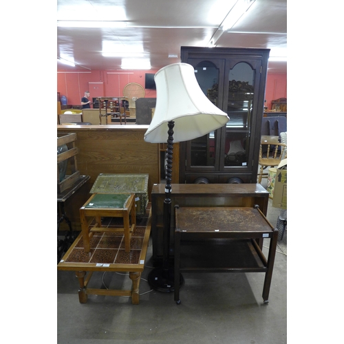 239 - An oak freestanding corner cabinet, a standard lamp, small bookcase, etc. (4)