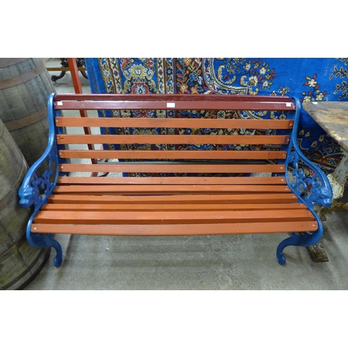 263 - A cast iron ended garden bench