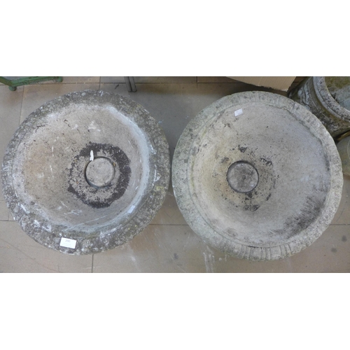 290 - A pair of concrete garden urns