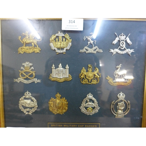 314 - A framed set of twelve British military cap badges