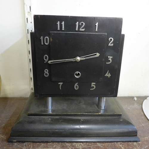 328 - An Art Deco ebonised mantel clock