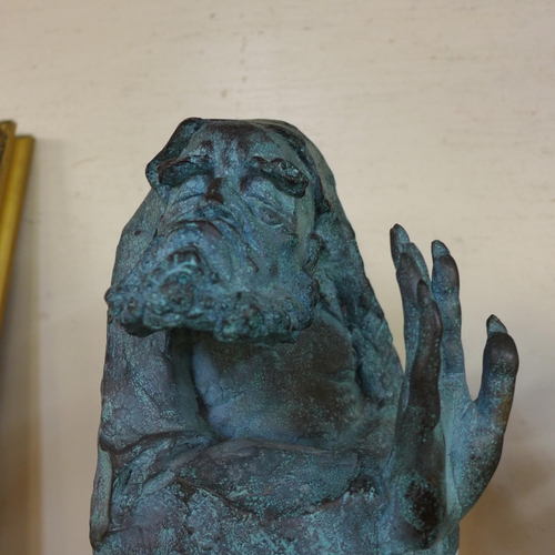 335 - A surrealist bronze figure of an immortal