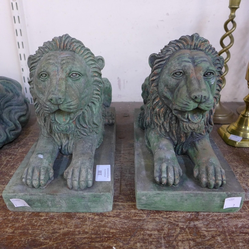 338 - A pair of concrete lions