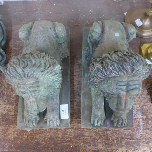 338 - A pair of concrete lions