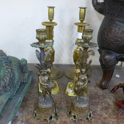 339 - Three pairs of brass candlesticks