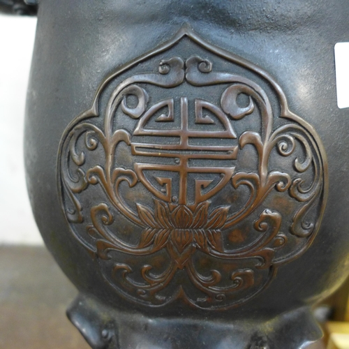 341 - An oriental bronze koro and cover