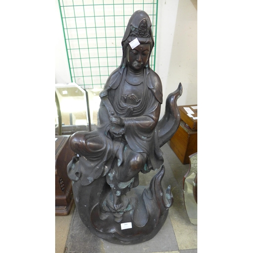 349 - A large oriental bronze figure of a deity