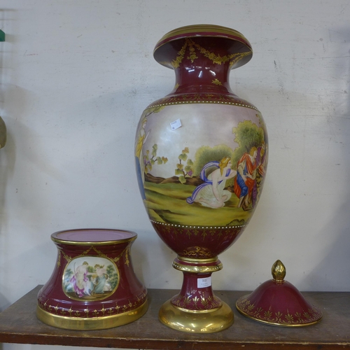 355 - A Vienna style gilt and maroon porcelain vase and cover, decorated with romantic scenes