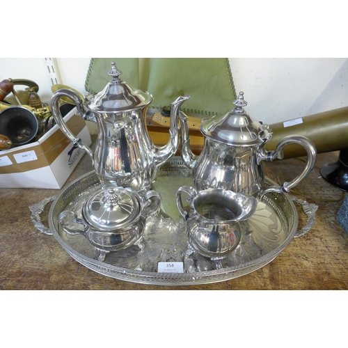 358 - A four piece silver plated tea service with tray