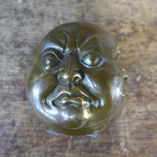 361 - A small oriental bronze four faced Buddha