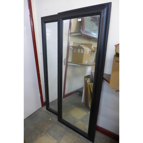 367 - A pair of large ebonised mirrors