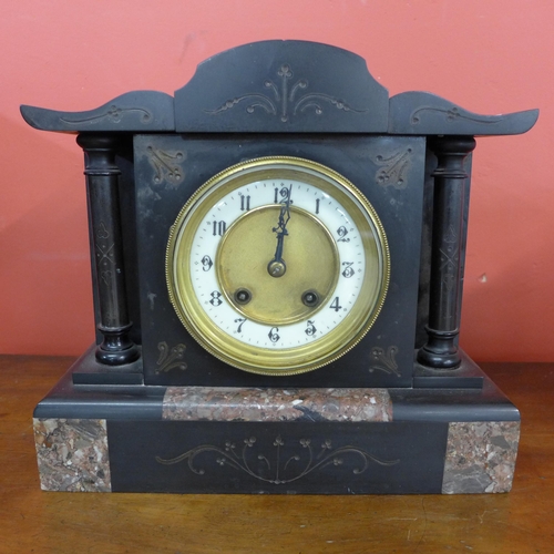 375 - A 19th Century French Belge noir mantle clock