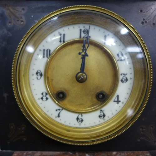 375 - A 19th Century French Belge noir mantle clock