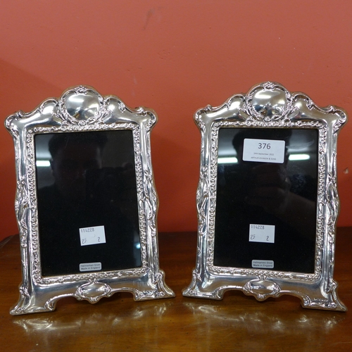 376 - A pair of silver photograph frames