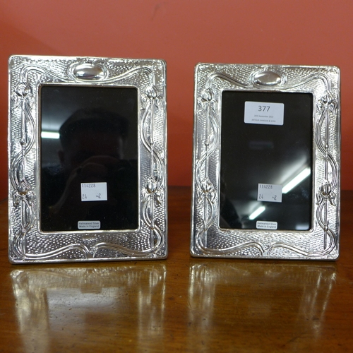 377 - A pair of silver photograph frames