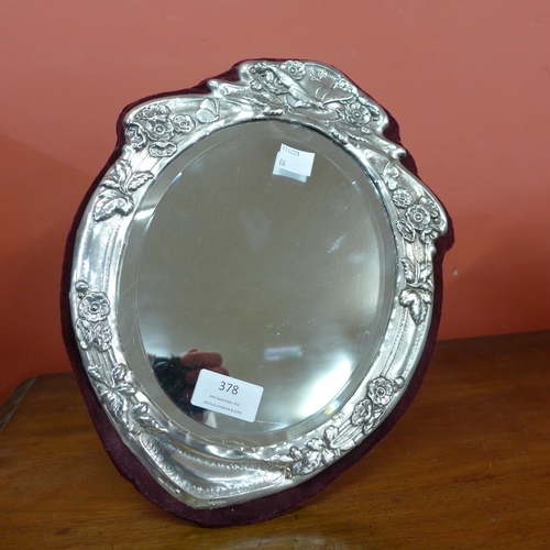 378 - A silver framed strut mirror