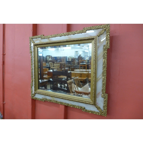 90 - A French style faux onyx and parcel gilt framed mirror