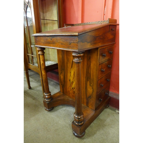 92 - A Victorian rosewood Davenport