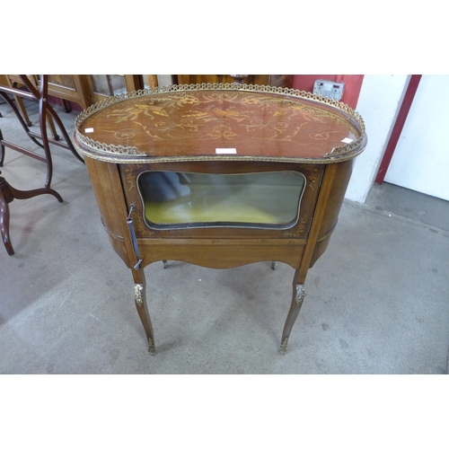 93 - A French Louis XV style marquetry inlaid mahogany and gilt metal mounted bijouterie table