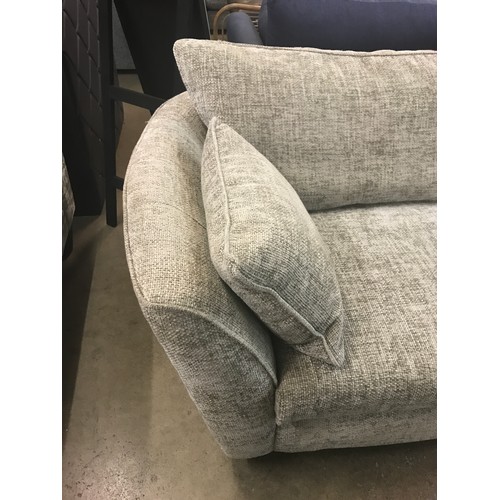 1347 - A grey upholstered four seater sofa